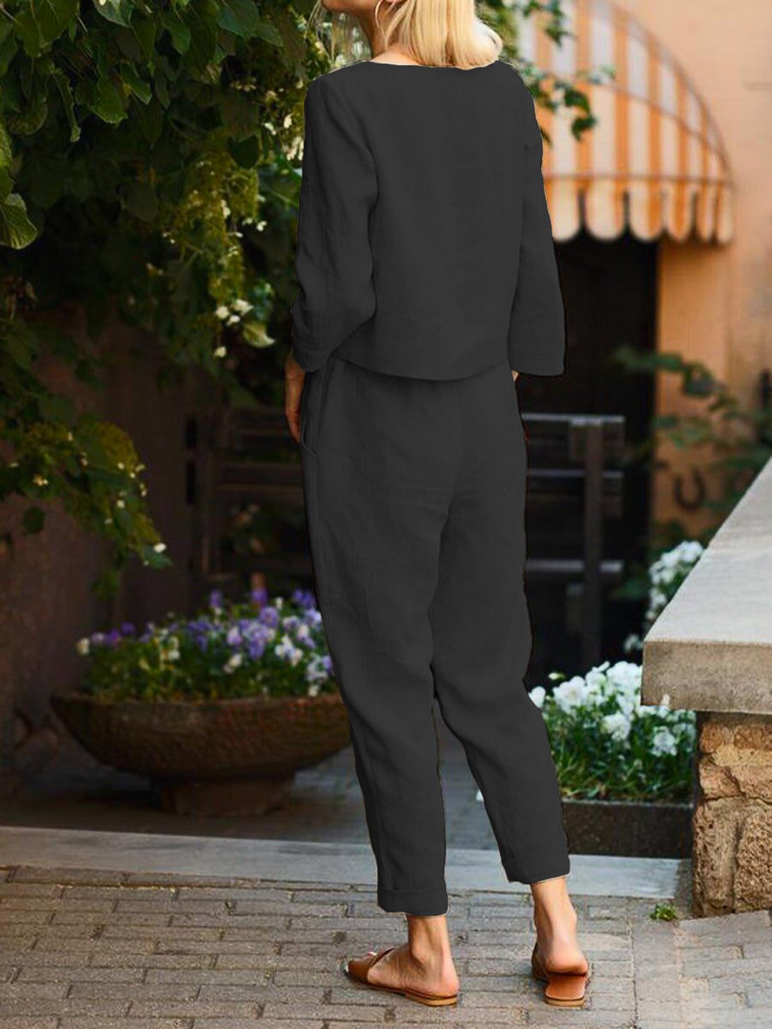 Woman wearing relaxed cotton-linen monochrome longline top and wide-leg pants set