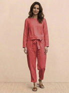 Cotton-linen monochrome capsule outfit with relaxed longline top and wide-leg pants in soft neutral tones