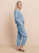 Woman wearing relaxed cotton-linen monochrome longline top and wide-leg pants set