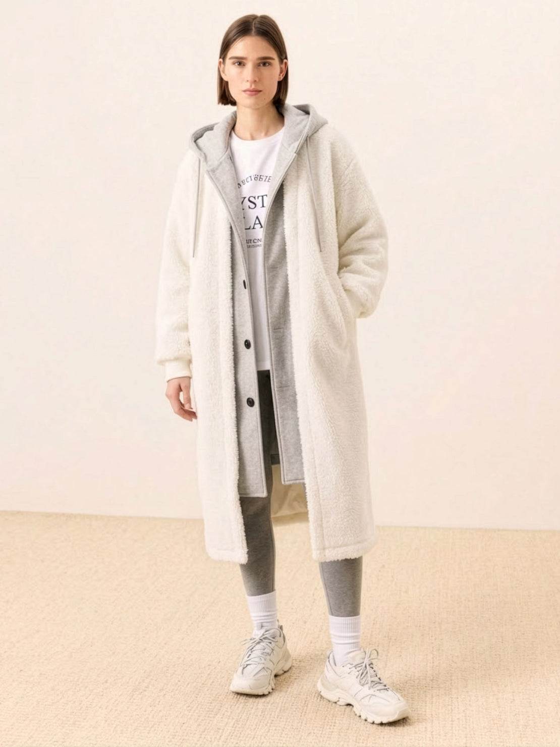 Woman wearing white everyday wear oversized sherpa long coat with cozy lining and relaxed fit