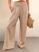 beige high-waist palazzo pants made of breathable linen cotton blend with wide legs and pockets