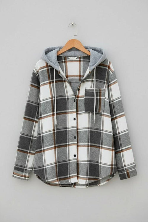 Highland Plaid Shacket with soft fleece lining, attached hood, button-front, and front pocket in gray and white plaid pattern.