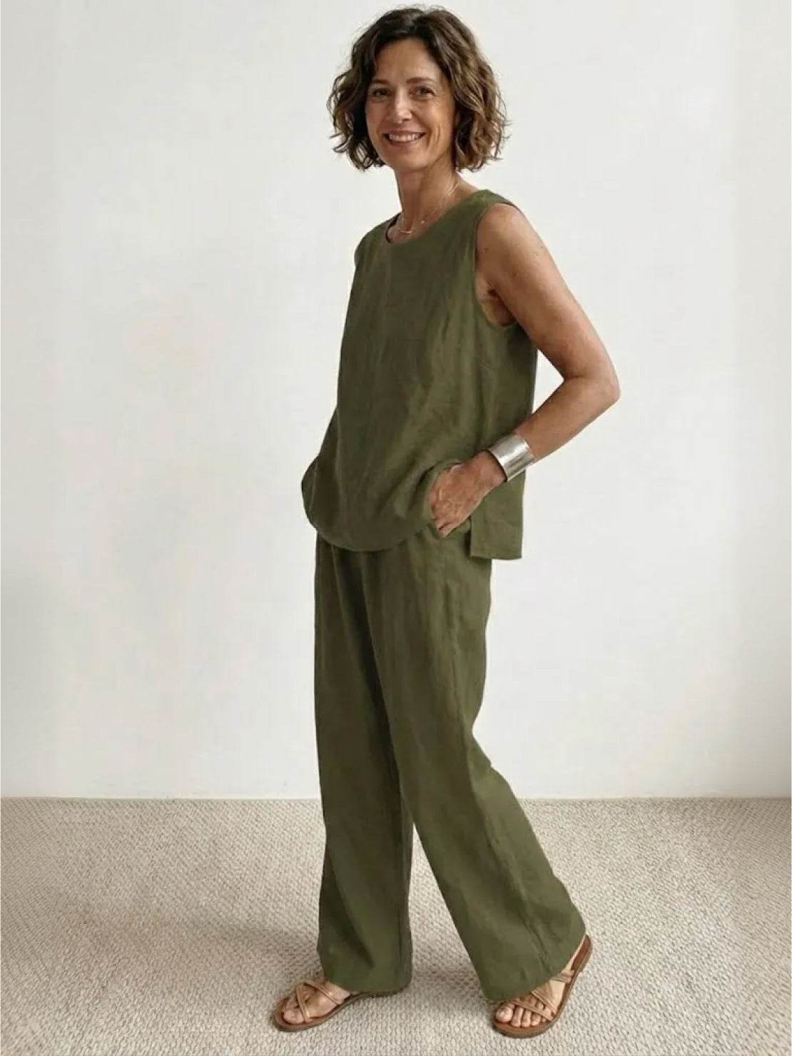 Loose solid color sleeveless two-piece set with oversized fit and breathable cotton blend fabric