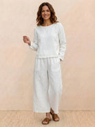 Loose solid color two-piece set with breathable cotton blend fabric and relaxed fit