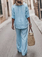 Model wearing oversized 100% cotton shirt with wide-leg pants co-ord set in relaxed fit