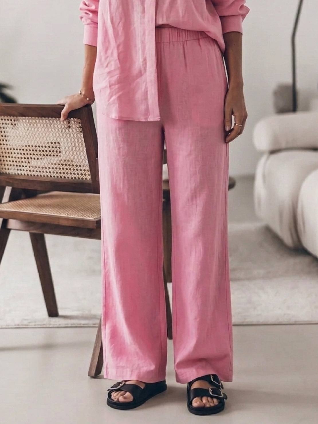 Model wearing oversized 100% cotton shirt and wide-leg pants co-ord set in relaxed silhouette