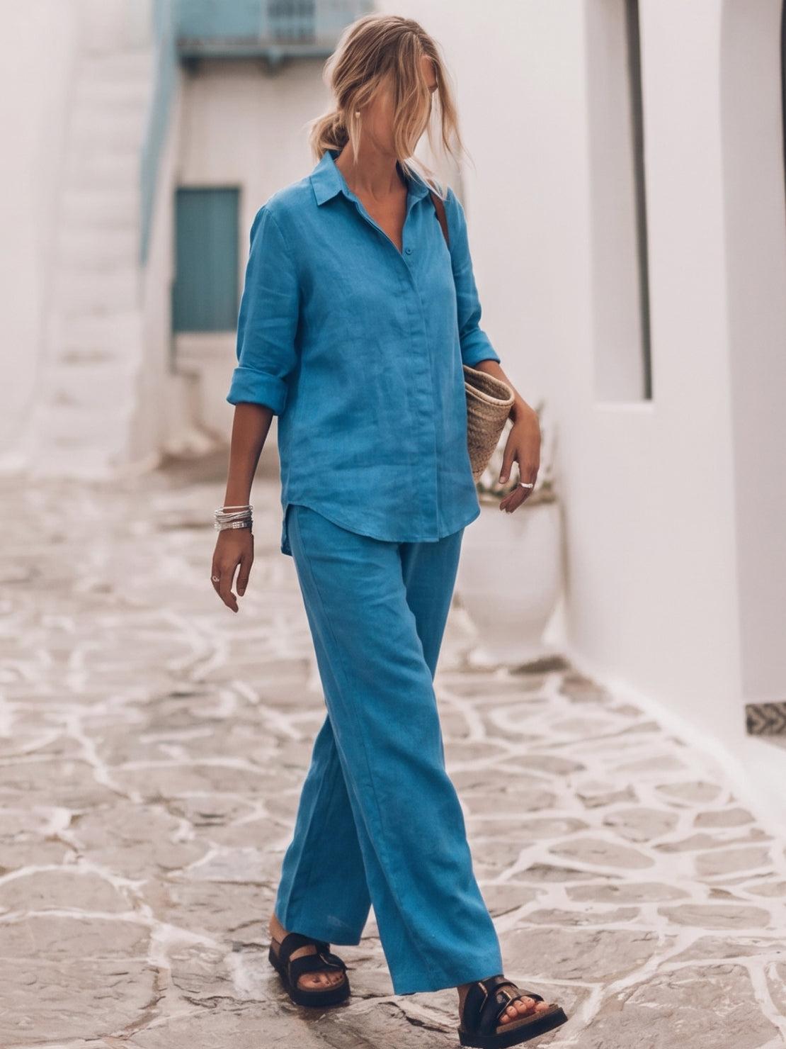Model wearing oversized 100% cotton shirt and wide-leg pants co-ord set in neutral tones