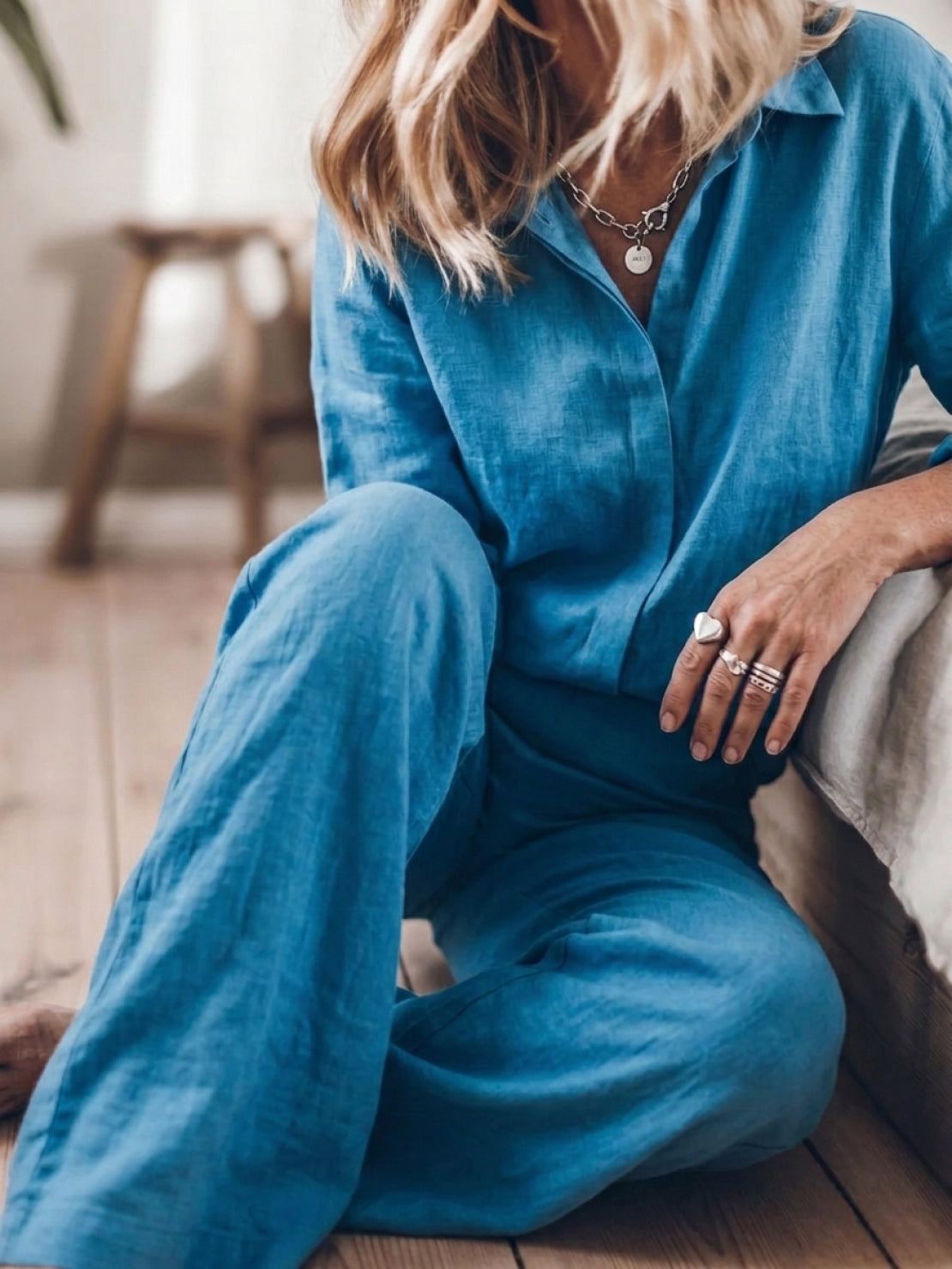 Model wearing an oversized 100% cotton shirt and wide-leg pants co-ord set in a relaxed, breathable fit