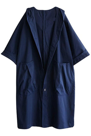 Oversized navy blue water-resistant windbreaker jacket with waterproof design and front pockets