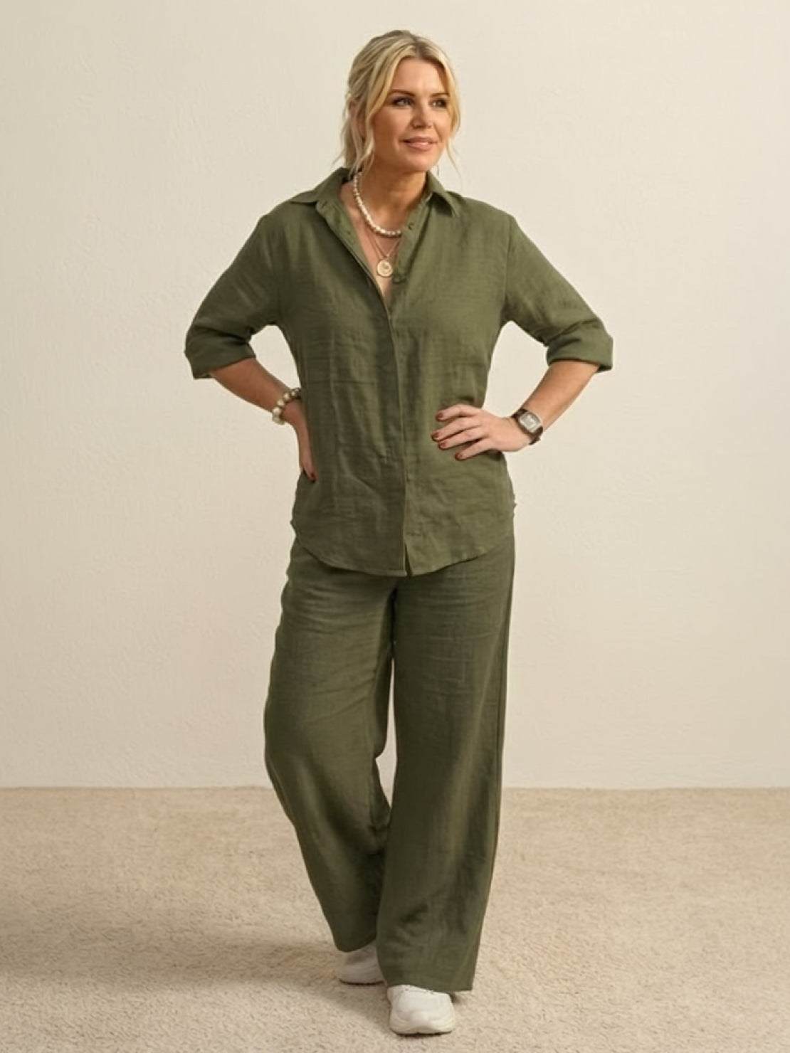 Woman wearing oversized 100% cotton olive green shirt and wide-leg pants co-ord set