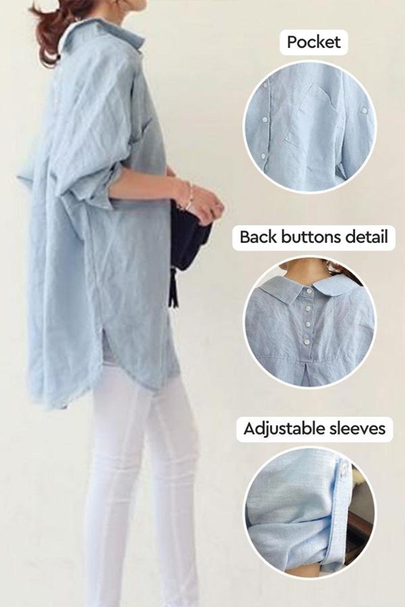 Woman wearing light blue oversized linen shirt with pocket, back buttons, and adjustable sleeves details