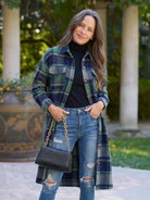 Oversized medium-length blue plaid wool-blend overshirt with relaxed fit and functional pockets