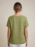 Relaxed fit linen button-up tee with lightweight breathable fabric and stylish buttons