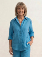 Woman wearing oversized 100% cotton shirt and wide-leg pants co-ord set
