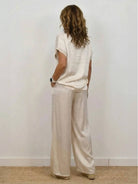 Elegant Silken Escape Satin Two-Piece Set with wide-leg pants and slimming top in silky-soft stretch fabric