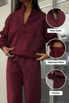 Burgundy cotton blend tracksuit with deep zipper, adjustable waist, and pockets for tailored comfort and style.