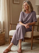 Loose fit co-ord set with soft-tailored top and wide-leg bottoms in solid color poly-cotton blend