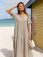 V-neck two-tiered maxi swing dress in flowy cotton fabric with irregular hemline and draped sleeves