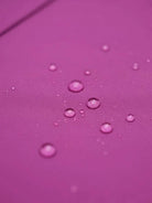 Water-repellent A-line hooded raincoat for women with insulated lining and matching belt