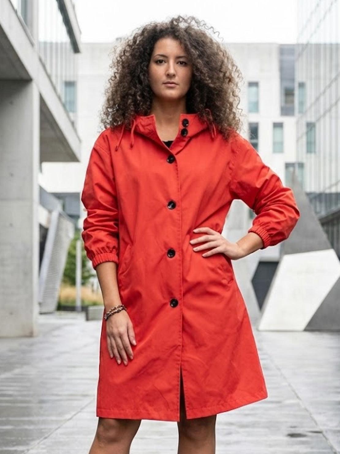 Water-resistant oversized hooded windbreaker rain jacket with multiple pockets and packable design