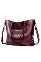 Elegant burgundy multi strap tote bag in PU leather with roomy interior and multiple compartments for versatile use